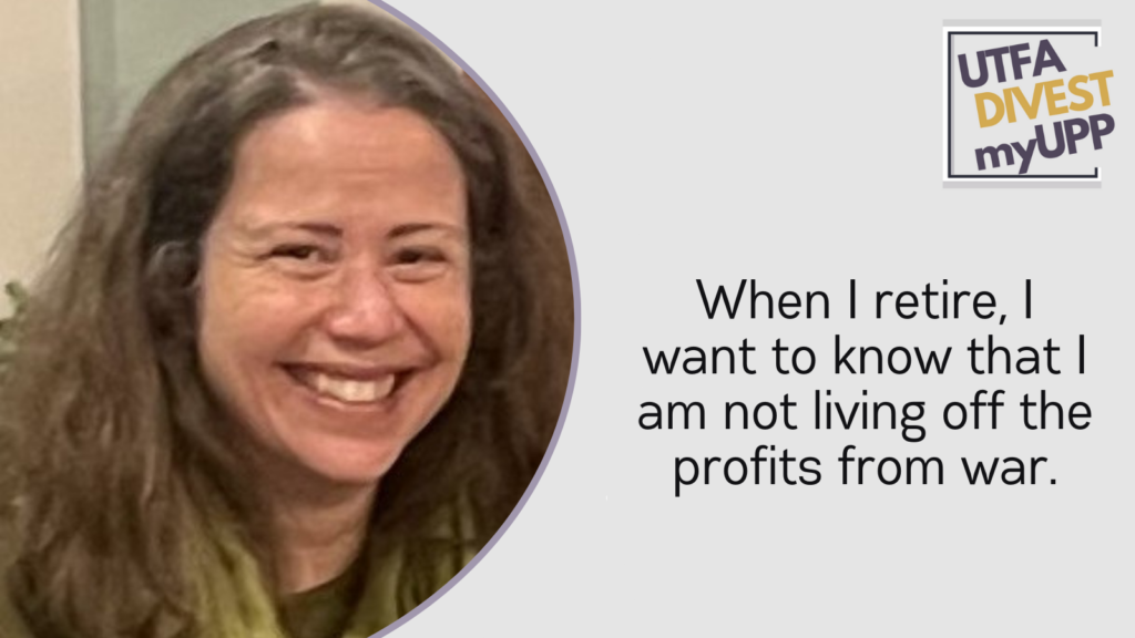 White woman with brown hair, dressed in green.