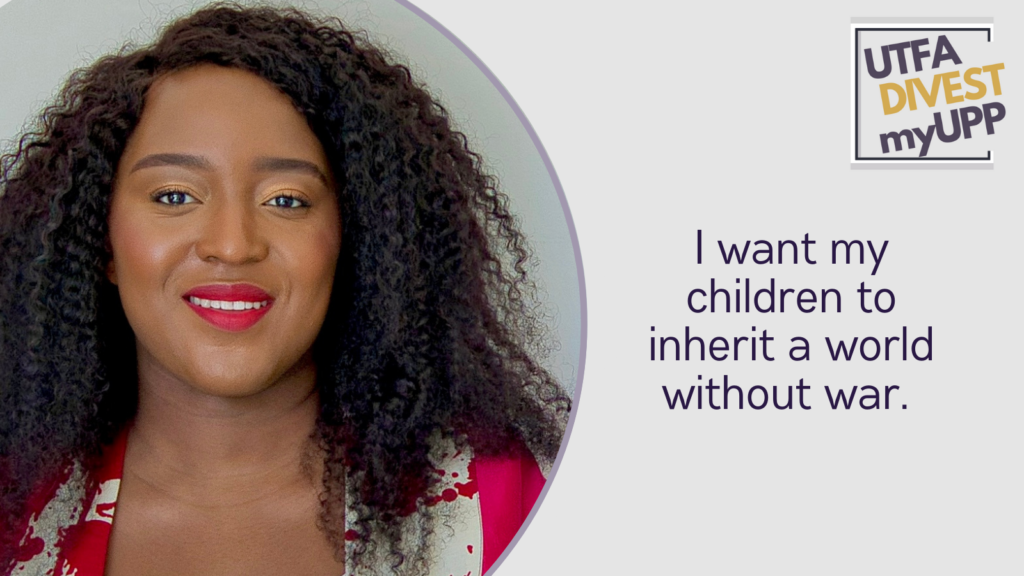 The image shows a 40 year old Black woman with a warm smile, wearing a red and white patterned outfit. She has voluminous, curly black hair that frames her face. Her makeup is polished, with a bold red lip color that complements her outfit. The background is a simple, neutral-colored wall, which keeps the focus on her. The overall composition suggests a confident and stylish presence. 