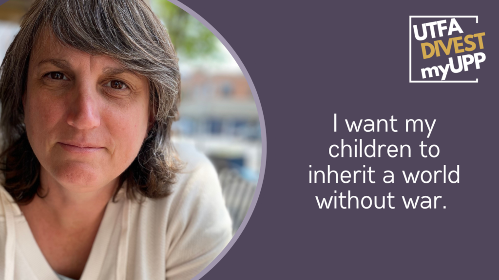 Picture of a professor with light brown wavy hair in a white shirt, looking directly at the camera.